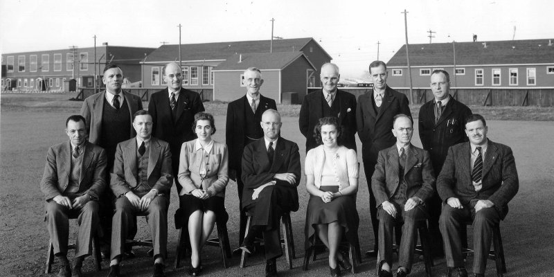 Wop May, centre, with civilian staff of No 2 Air Observer School
