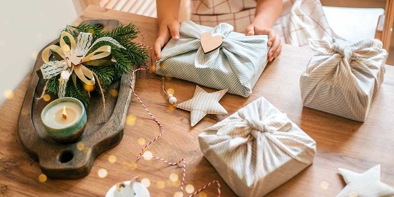 christmas gifts wrapped with fabric