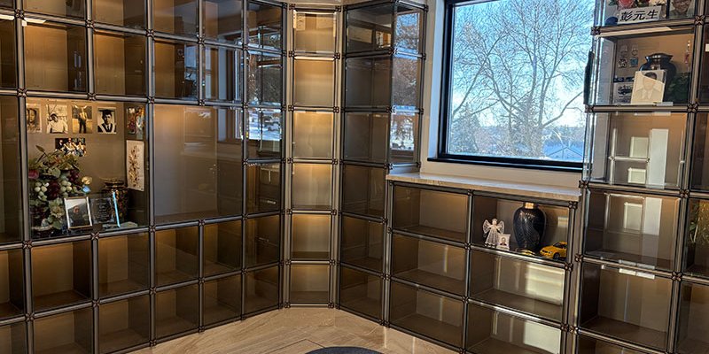 interior room with urns in niches and sitting stool