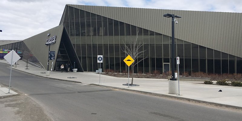 Graded road and walkway in front of Clareview Recreation Centre