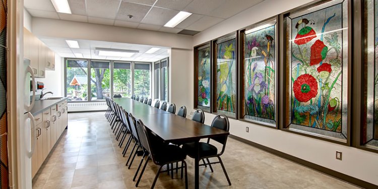 kitchen meeting room with rectangular table with chairs