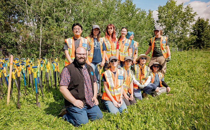 Group photo of Root for Trees volunteers in a plating location