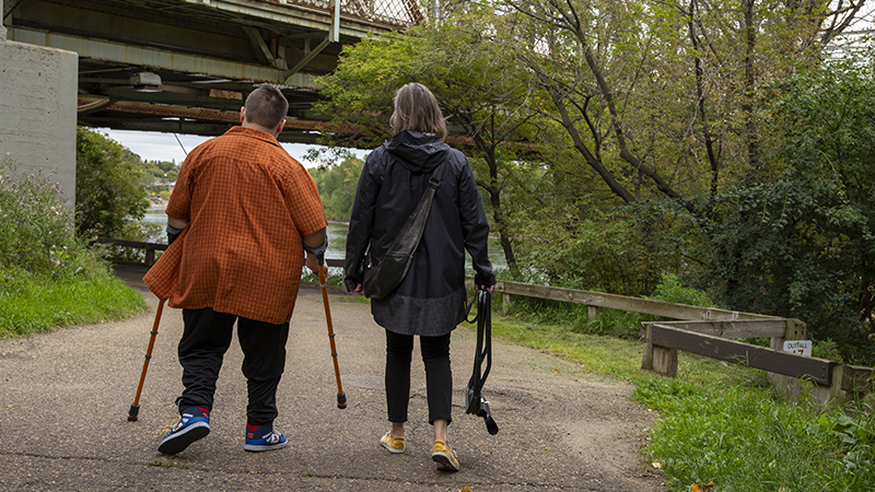 Walkers in the river valley using mobility devices